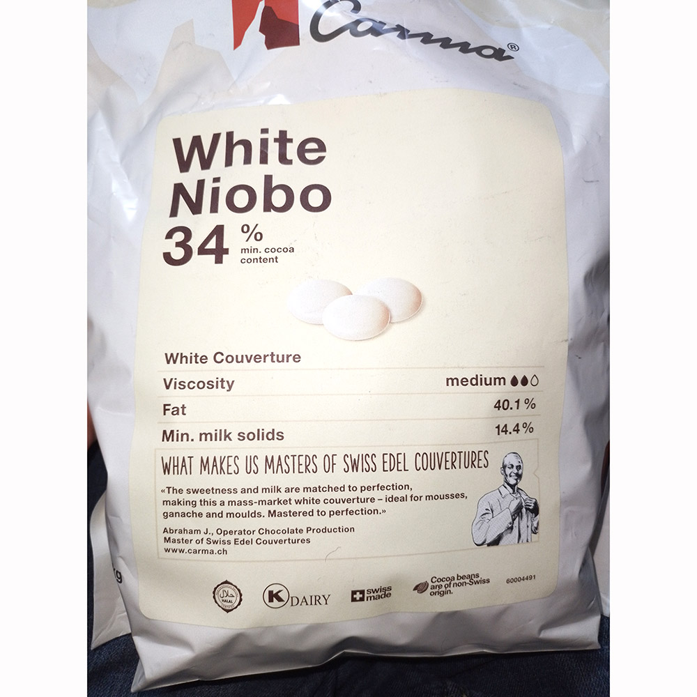 Третье дополнительное изображение для товара Шоколад белый Carma White Niobo 34%, 1.5 кг Швейцария (арт. CHW-O050NIBOE6-Z71)